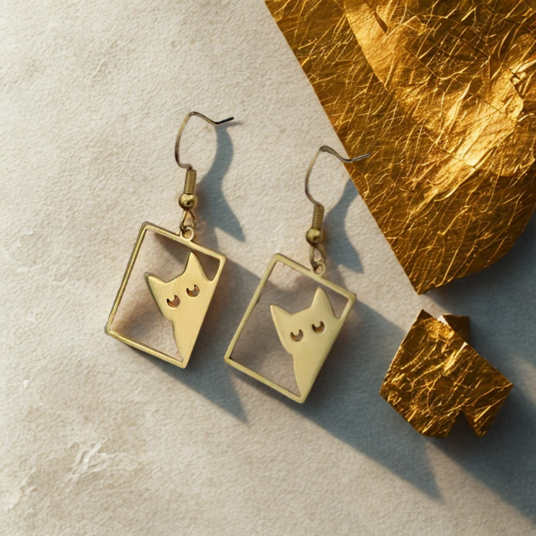 Gold cat earrings with a geometric rectangular frame and cute cat face design